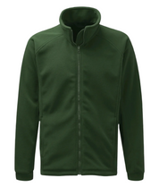 A green full-zip fleece jacket with a high collar and minimalist design. The jacket features a smooth front zipper, clean seam lines, and a soft, insulating fabric ideal for layering in cold weather. Sleeves are cuffed for a snug fit, and side pockets are subtly integrated into the silhouette. by MAK Boots & Garments
