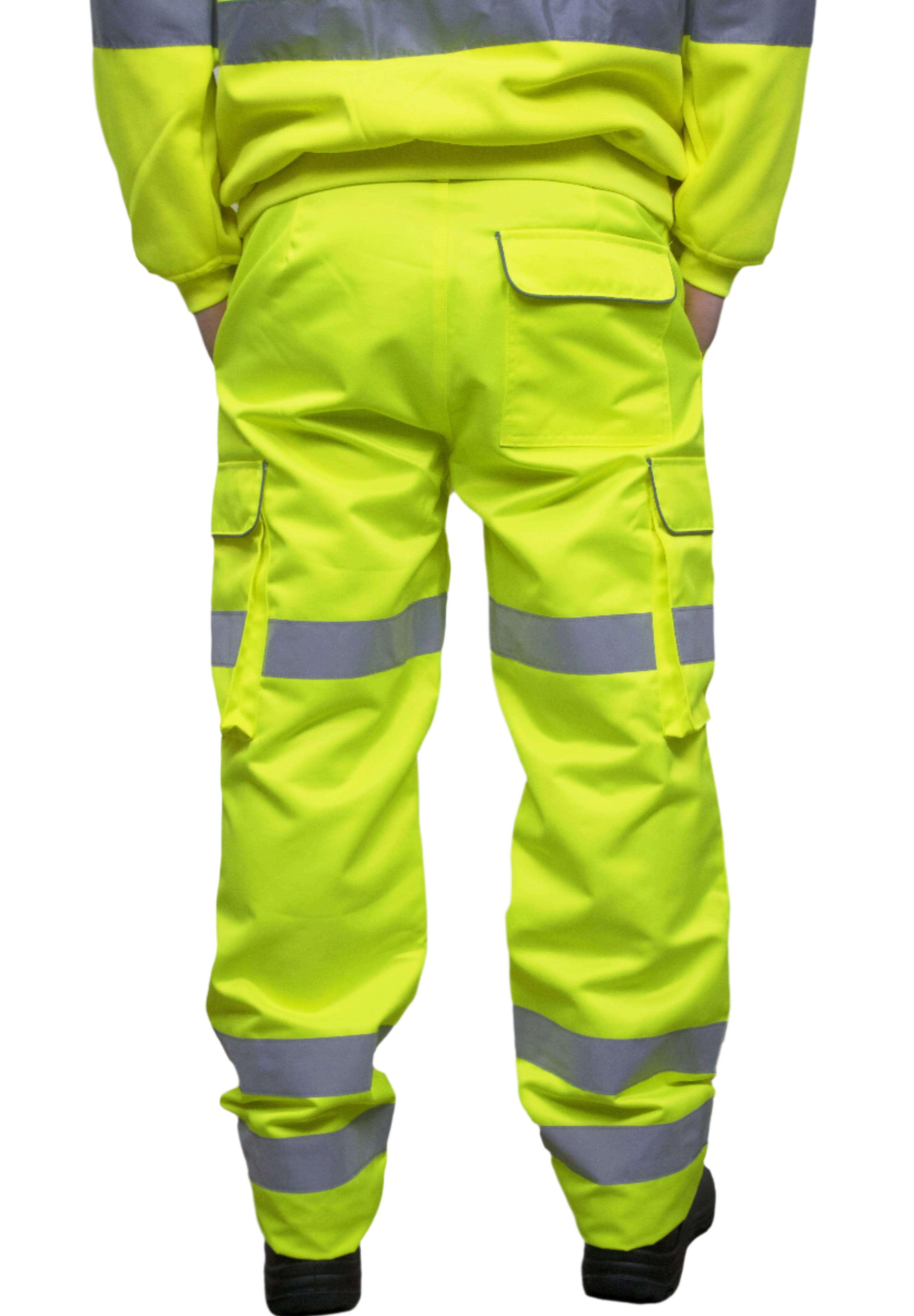 A person wearing high-visibility yellow work trousers with reflective grey stripes around the knees, shins, and thighs. The pants have a cargo pocket on the side and are paired with black safety boots. Only the lower half of the person is visible. The trousers appear to be part of a workwear or safety uniform. by MAK Boots & Garments