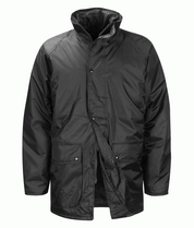 Black waterproof jacket with a high collar, dual front flap pockets, and a snap-button storm flap over a full zip closure, built for rugged utility and all-weather reliability — by MAK Boots & Garments.