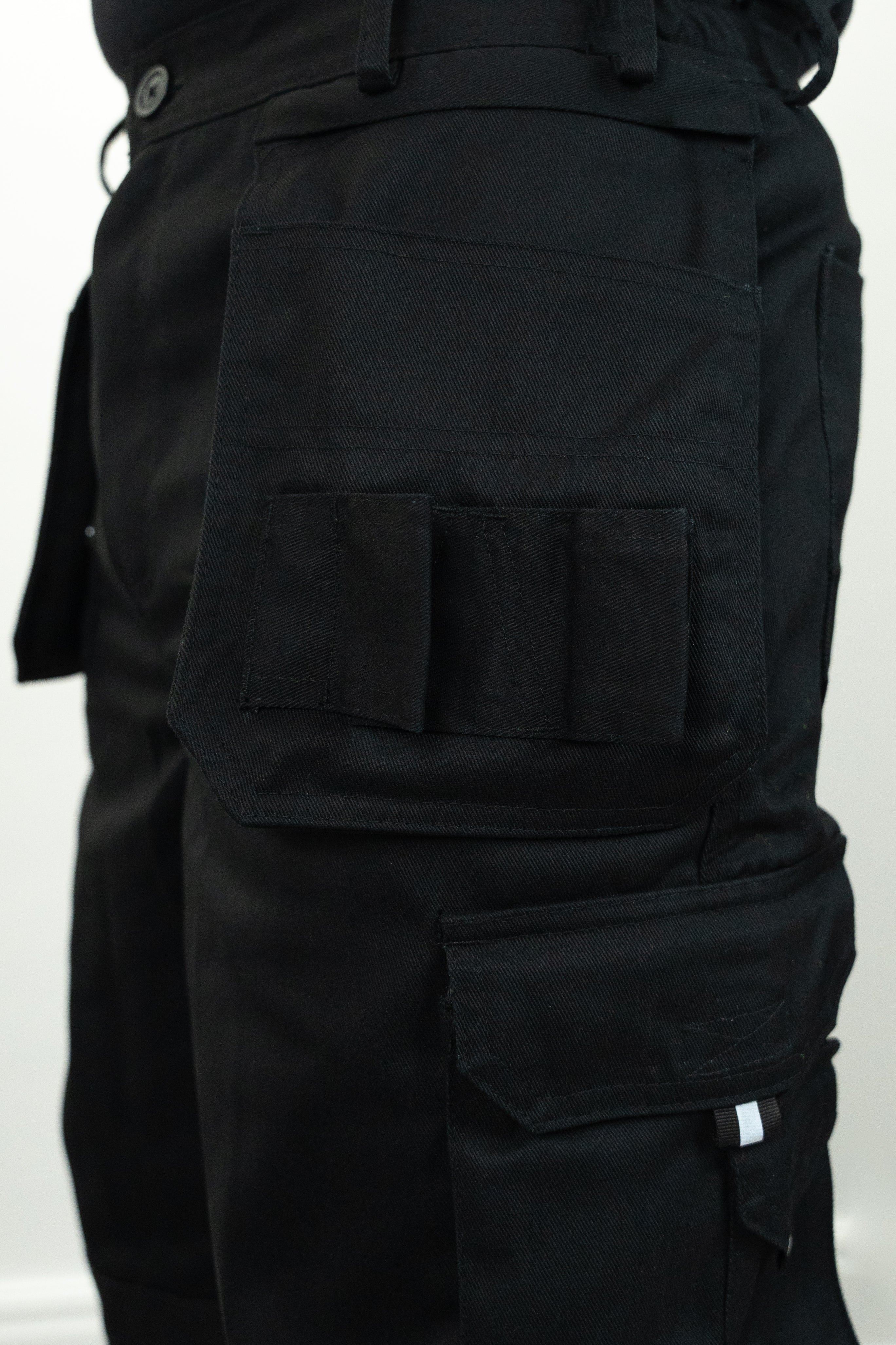 close up of detachable side pocket with tool holding attributes