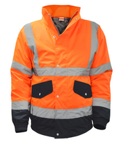 High-visibility orange and black work jacket featuring silver reflective tape across the chest, arms, and waist. Equipped with snap-button flap pockets, a zip front with a storm flap, and elastic cuffs for a secure fit. Designed for enhanced visibility and durability in hazardous work environments. by MAK Boots & Garments