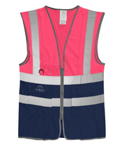 High-visibility two-tone safety vest in fluorescent pink and navy with silver reflective tape, a clear ID pocket, D-ring loop, and multiple front utility pockets.
by MAK Boots & Garments
