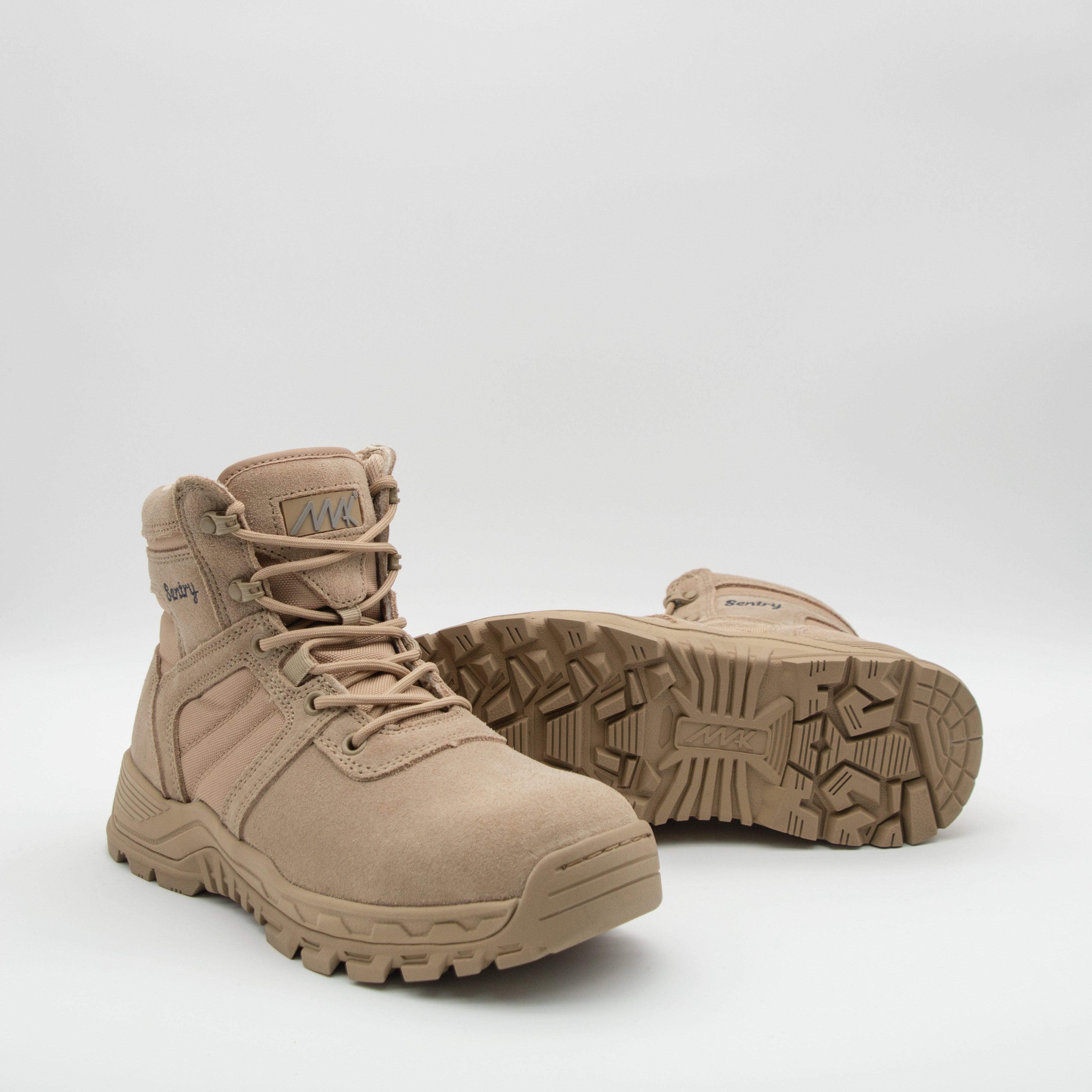 Tan tactical boots on a white background