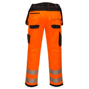 Back view of Portwest PW3 Hi-Vis Stretch Holster Pocket Trousers in orange/black, showcasing the high-rise back waistband, reinforced panels, and triple-stitched seams for durability.