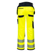 Back view of Portwest PW3 Hi-Vis Stretch Holster Pocket Trousers in yellow/black, showcasing the high-rise back waistband, reinforced panels, and triple-stitched seams for durability.