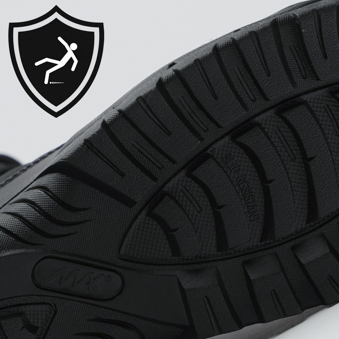protector 9&quot; black suede side zip close up of slip resistant sole design with mak logo