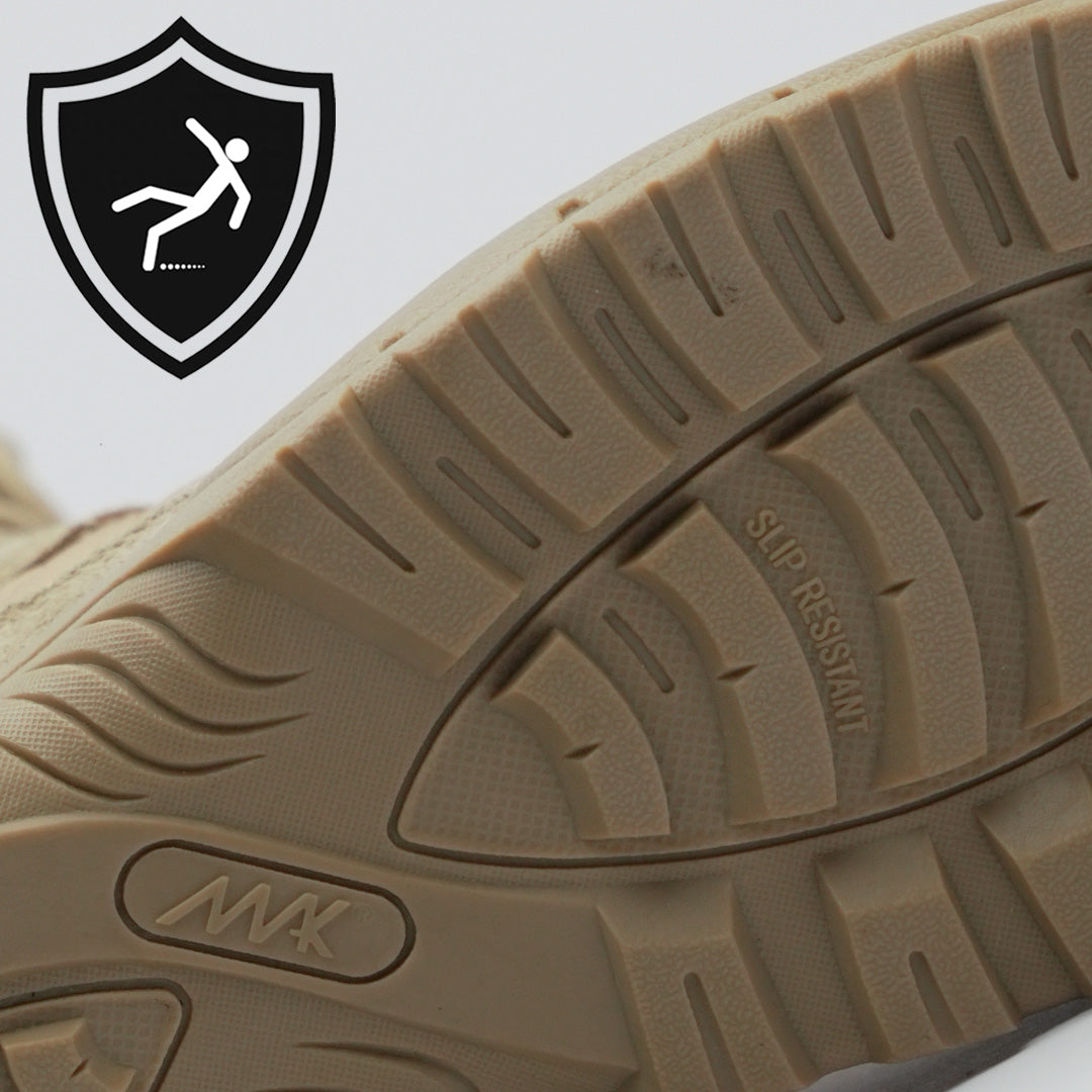 protector 9&quot; desert tan side zip showing the slip resistant sole design and mak logo