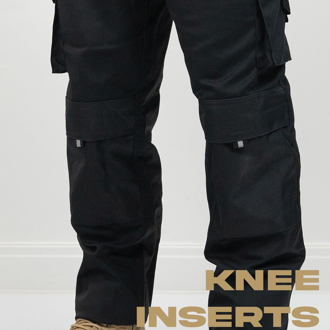 Close up of models knees showing knee inserts on black cargo work pants
