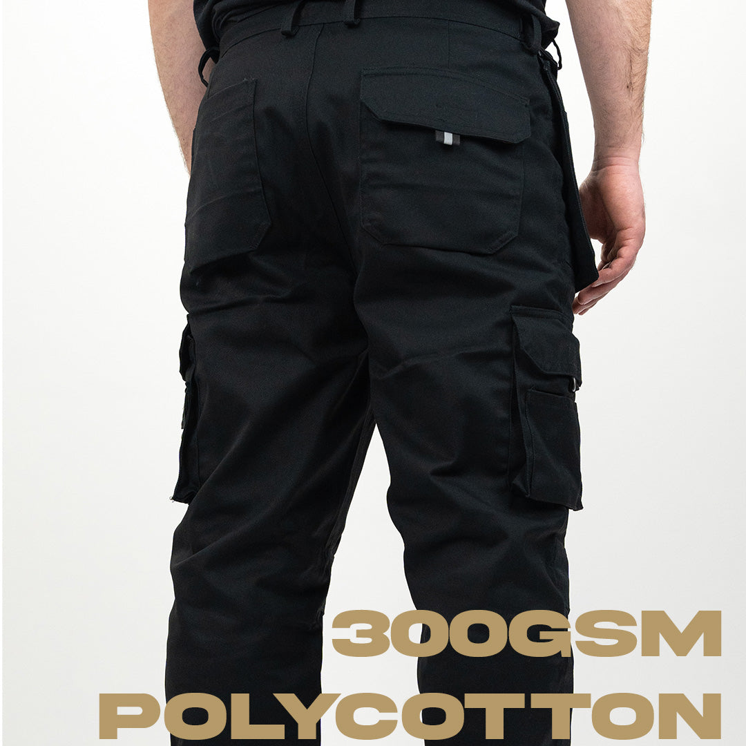 Model wearing black cargo trousers. Behind view 