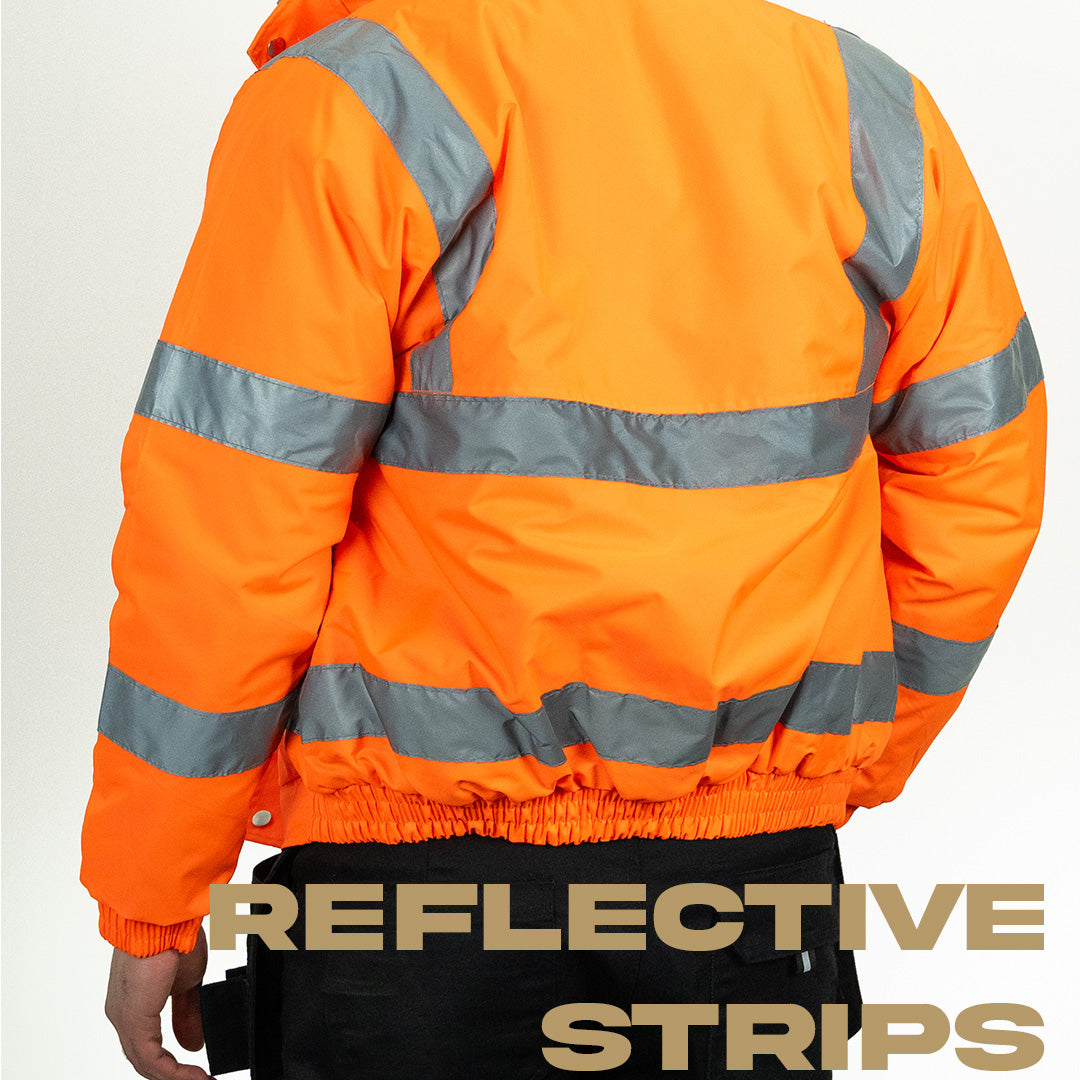 person wearing hi vis orange bomber jacket standing at an angle