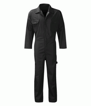 industrial black utility coverall with a front zip closure, snap-collar, chest flap pockets, and reinforced stitching, designed for durability, freedom of movement, and full-body protection on the job — by MAK Boots & Garments.