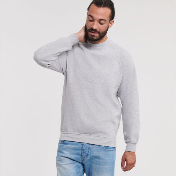 Grey Russell Europe sweatshirt with stain-resistant finish, tubular body, and raglan sleeve design; comfortable and workwear-ready.